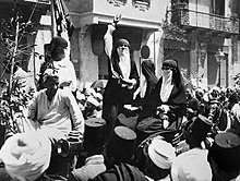 B&W photo of women in a crowd