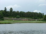 a series of terraces, with a river in the foreground