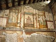 Fresco na Casa dos Dióscuros, en Pompeia.