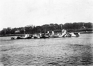 USS Fanning (DD-37), in port, probably at Queenstown, Ireland, after her 17 November 1917 fight with the German submarine U-58. She is painted in pattern camouflage.