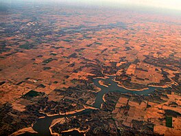 Salmonie Lake in the foreground, with the town of Huntington, Indiana to the left background