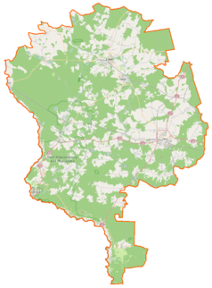 Mapa konturowa powiatu żarskiego, po prawej znajduje się punkt z opisem „Grabik”