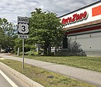 US Route 3 sign with Business sign above and direction sign below