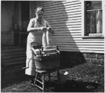 Image:REA woman works washboard.gif