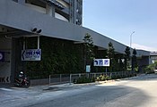 Entrances to the park and ride facility (right) and the drop-off lay-by (left) at Persiaran Bandar Utama.