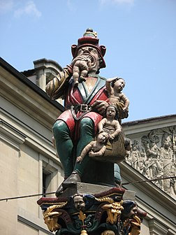 La Kindlifresserbrunnen, ou fontaine de l'ogre (littéralement du mangeur d'enfant), sur la Kornhausplatz de Berne (Suisse). (définition réelle 2 736 × 3 648)