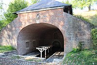 Le lavoir à voûte, rue de Séchelles, sur une partie de l’emplacement de l’ancien château[23] .