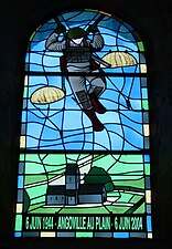 Stained glass window in church at Angoville-au-Plain, France.