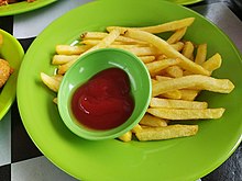 French fries on a paper plate