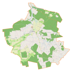 Mapa konturowa gminy Radoszyce, blisko centrum na dole znajduje się punkt z opisem „Kaliga”