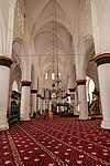 The carpet pattern marks the ranks for the faithful to pray towards Mecca (obliquely on the right) in the Selimiye Mosque of Northern Nicosia