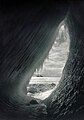 Grotto in an iceberg with the Terra Nova ship in the background (1911) during the 'British Antarctic Expedition' by Herbert G. Ponting