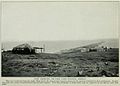 View of part of Port Dezhnev, 1913. The American-style cabins near the lagoon are probably a trading station.