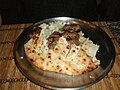 Image 18Bosnian ćevapi with onions in a somun. (from Culture of Bosnia and Herzegovina)