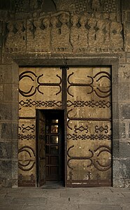 Doors of Porch Saint-John, with vestiges of the Last Supper mosaics above them