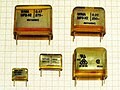 Capacitores de supressão de RFI em papel metalizado (MP3) com marcas de segurança para o padrão de segurança “X2”