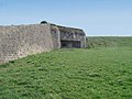 Les créneaux de tir de la façade.