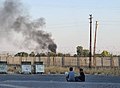 Kamışlı'dan yükselen dumanların Nusaybin'den görüntüsü.