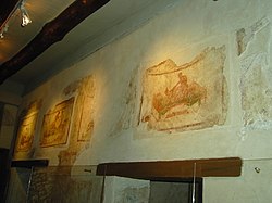 Erotic frescos on the walls of the Lupanar brothel