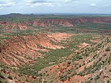 Side canyon carved by erosion.