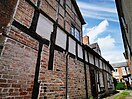 Timber in side elevations of houses in Wem gentrified in the Georgian period.