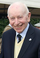 John Surtees wearing a suit at a function in 2011