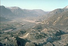 North Fork Toutle River valley, filled with Mount St. Helens landslide debris and hummocks.