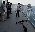 Image 48A private guard escort on a merchant ship providing security services against piracy in the Indian Ocean (from Piracy)