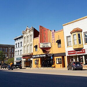 Photo of the theatre's sign—the marquee, "Memorabilia Museum", and vertical "Plaza" section.