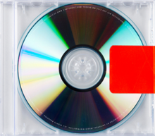 A compact disc in a crystal-clear jewel case with orange sticker placed on the right side.