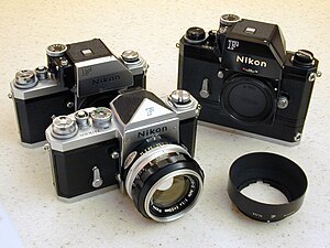 Foreground: Nikon F with eyelevel prism; Rear, left: Nikon F with FTn Photomic prism; Rear, right: Nikon F with FTn Photomic prism and F36 motor drive