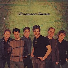 Photograph of a group of men staring at the camera. They are smiling. In the background is a map of Nashville, Tennessee. The words EMERSON DRIVE, in italics, are in the middle.