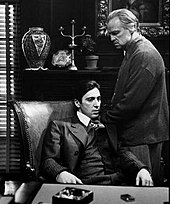 A screenshot of Michael and Vito Corleone in The Godfather