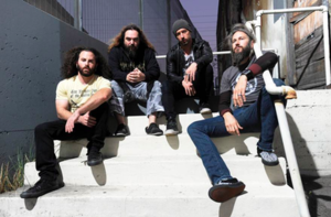 From left to right: former drummer Dave Elitch, Max Cavalera, Greg Puciato, and Troy Sanders