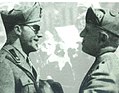 Carlo Borsani (sulla sinistra) e Benito Mussolini