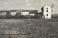 Panoramica esterna del complesso architettonico del Molino Dorino in un'immagine del 1989. Sullo sfondo la torre dello stabilimento F.I.L.A. di Pero