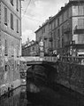 La Cerchia dei Navigli in via Santa Sofia a Milano e il ponte di corso di Porta Romana con la statua di San Giovanni Nepomuceno in un'immagine della fine degli anni venti del XX secolo