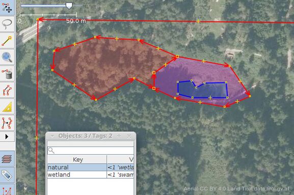 Select both the wetlands and the surrounding woods