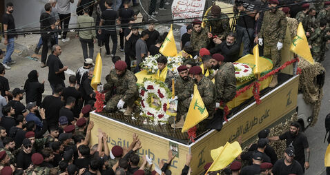 Israel bombards Hezbollah, killing a top commander, while families flee Lebanon