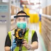 Amazon Singapore employee with safety measure in our fulfillment centre