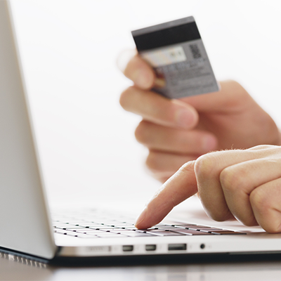 A person making payment of his visa credit card