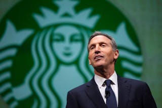 Howard Schultz, CEO of Starbucks, speaks during the company's annual shareholders meeting in Seattle