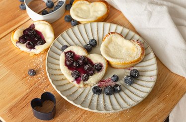 Blueberry and cream cheese danishes on a fluted plate