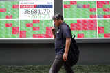 Japan's Nikkei skids 1% as yen intervention risks rise