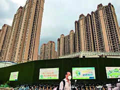 China’s Slump in Home Sales Slows After Top Cities Ease Policy