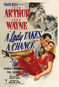 John Wayne and Jean Arthur in A Lady Takes a Chance (1943)