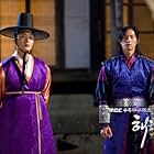 Jung Il-woo and Song Jae-rim in Haereul poomeun dal (2012)