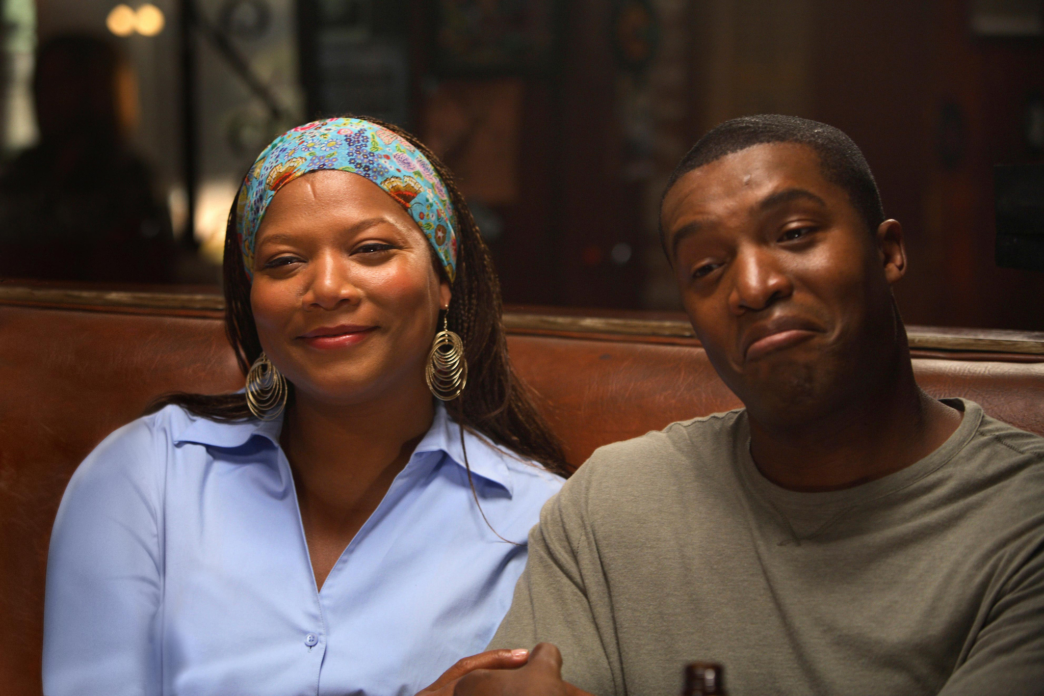 Queen Latifah and Roger Cross in Mad Money (2008)