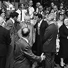 Nikita Khrushchev visits with Frank Sinatra, Maurice Chevalier, Louis Jourdan and Shirley MacLaine on the set of the film "Can-Can" at 20th Century Fox' Hollywood studio 09-19-1959