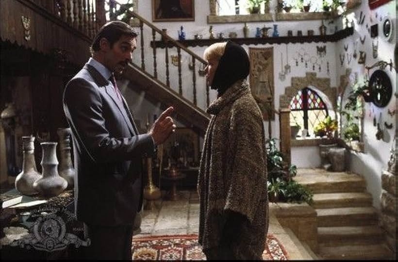 Ellen Burstyn and Fabio Testi in The Ambassador (1984)